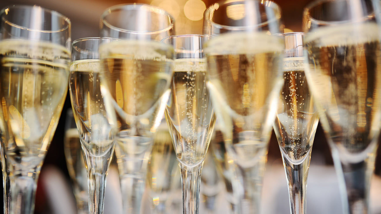 Traditional method sparkling wine equipment including riddling and disgorging systems